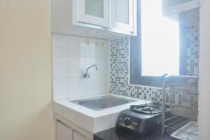 Cozy and Simply 1BR at Kebagusan City Apartment By Travelio