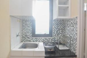 Cozy and Simply 1BR at Kebagusan City Apartment By Travelio