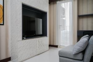 Cozy Design 1BR Apartment at Scientia Residence By Travelio