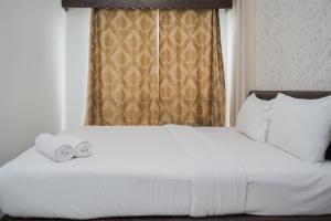 Cozy Design 1BR Apartment at Scientia Residence By Travelio