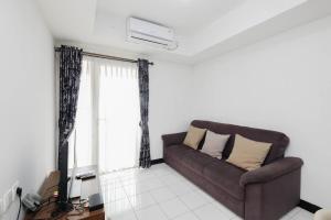 Nice and Elegant 1BR at The Wave Kuningan Apartment By Travelio