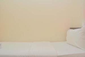 Comfy and Best Deal 2BR at Green Pramuka City Apartment By Travelio