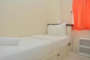 Comfy and Best Deal 2BR at Green Pramuka City Apartment By Travelio