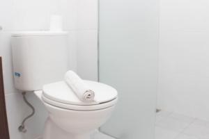 Homey and Minimalist 2BR at Patraland Urbano Apartment By Travelio