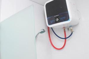 Homey and Minimalist 2BR at Patraland Urbano Apartment By Travelio