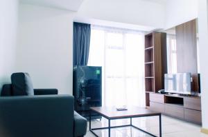 Good Deal 1BR Apartment M-Town Residence near SMS By Travelio