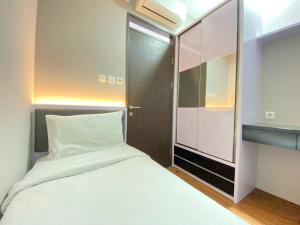 Homey 2BR Apartment at Mekarwangi Square Cibaduyut By Travelio