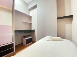 Homey 2BR Apartment at Mekarwangi Square Cibaduyut By Travelio