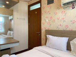 Homey and Comfortable 1BR at Cinere Resort Apartment By Travelio
