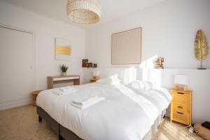 Maisons de vacances Zen Paradise - Near the city center - Garden : photos des chambres