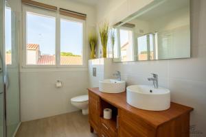 Maisons de vacances Zen Paradise - Near the city center - Garden : photos des chambres