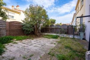 Maisons de vacances Zen Paradise - Near the city center - Garden : photos des chambres