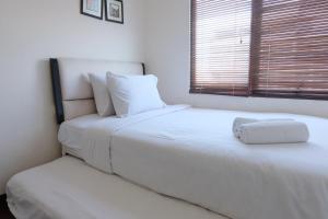 Spacious 2BR Apartment at Grand Setiabudi By Travelio