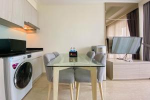 Nice and Minimalist 2BR at Menteng Park Apartment