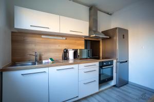 Appartements L'oranger Proche centre ville WIFINETFLIX : photos des chambres