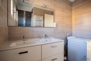 Appartements L'oranger Proche centre ville WIFINETFLIX : photos des chambres