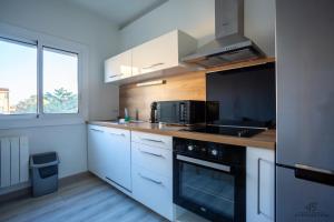Appartements L'oranger Proche centre ville WIFINETFLIX : photos des chambres