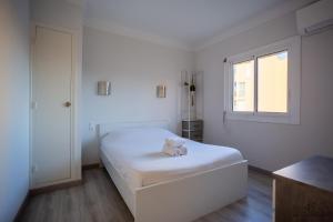 Appartements L'oranger Proche centre ville WIFINETFLIX : photos des chambres