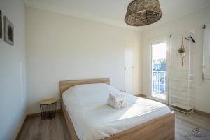 Appartements L'oranger Proche centre ville WIFINETFLIX : photos des chambres