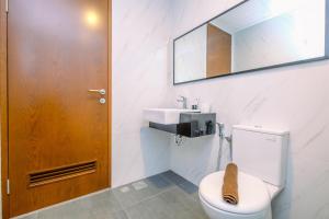 Best Homey and Nice 1BR at Ciputra World 2 Apartment By Travelio