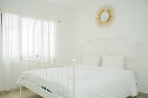 Strategic and Homey 2BR at Puri Garden Apartment near Mall By Travelio