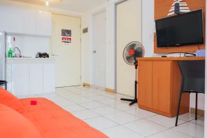 Restful and Cozy 2BR Apartment at M-Town Residence By Travelio