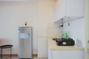 Restful and Cozy 2BR Apartment at M-Town Residence By Travelio