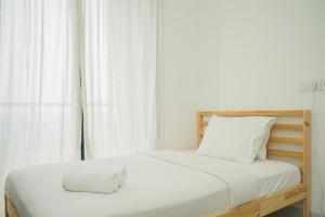 Studio Room with Comfortable Design at Sky House BSD Apartment By Travelio