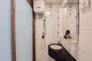 Studio Room with Comfortable Design at Sky House BSD Apartment By Travelio