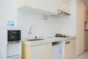 Studio Room with Comfortable Design at Sky House BSD Apartment By Travelio