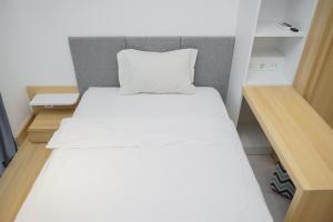 Cozy Studio Room at Sky House BSD Apartment By Travelio