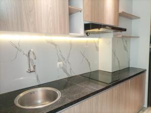 Elegant and Comfortable Studio Patraland Amarta Apartment By Travelio