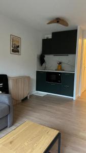 Studio cosy Mont-Dore avec vue, balcon, parking