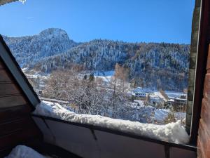 Studio cosy Mont-Dore avec vue, balcon, parking