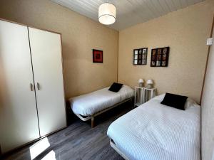 Appartements La Salamandre - Situe en plein coeur de ville et proche des thermes : photos des chambres