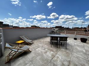 Appartements La Salamandre - Situe en plein coeur de ville et proche des thermes : photos des chambres