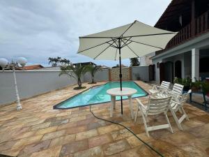 Saquarema- Lagoa, praia , piscina e jogos