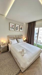 N28 3 Bedrooms & Private Gym just walking to Stade Moulay Abdellah