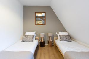 Appartements LE RHENANUS Jean Geiler de Kaysersberg - appartement ideal pour famille, au calme - centre ville - parking gratuit : photos des chambres