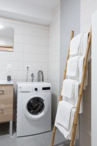 Appartements LE RHENANUS Jean Geiler de Kaysersberg - appartement ideal pour famille, au calme - centre ville - parking gratuit : photos des chambres