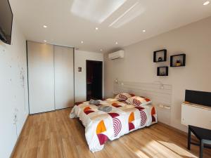 Appartements Suite independante - Le Coquelicot : photos des chambres