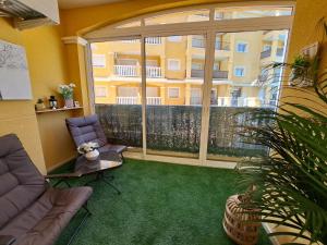Sunny ground floor apartment with a large terrace and direct access to the pool