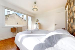 Appartements The Opal - 2bds in the city center : photos des chambres