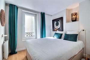 Appartements PARISIAN HOME l MONTORGUEIL : photos des chambres