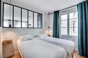 Appartements PARISIAN HOME l MONTORGUEIL : photos des chambres