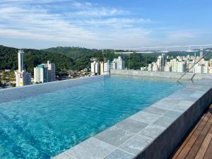 Loft próximo a Vila Germânica e FURB com vaga.