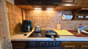Family-friendly apartment in a village house 25 km and 30 mins away from Thessaloniki