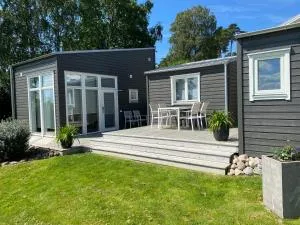 Tjörn Gäststuga nära Hakefjorden - Gläshed