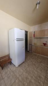 Casa na praia a 450 metros do mar com piscina, garagem e churrasqueira