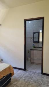 Casa na praia a 450 metros do mar com piscina, garagem e churrasqueira